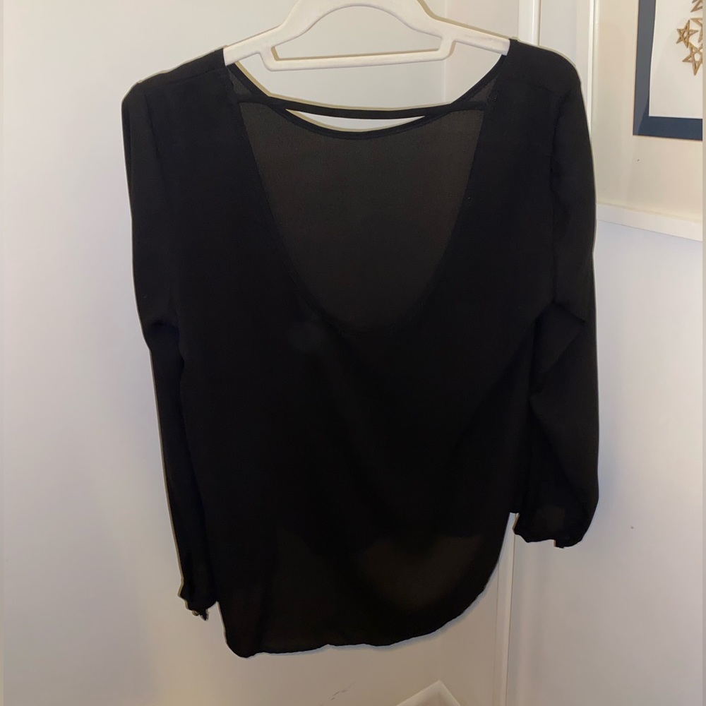open back with a strap from shoulder to shoulder
